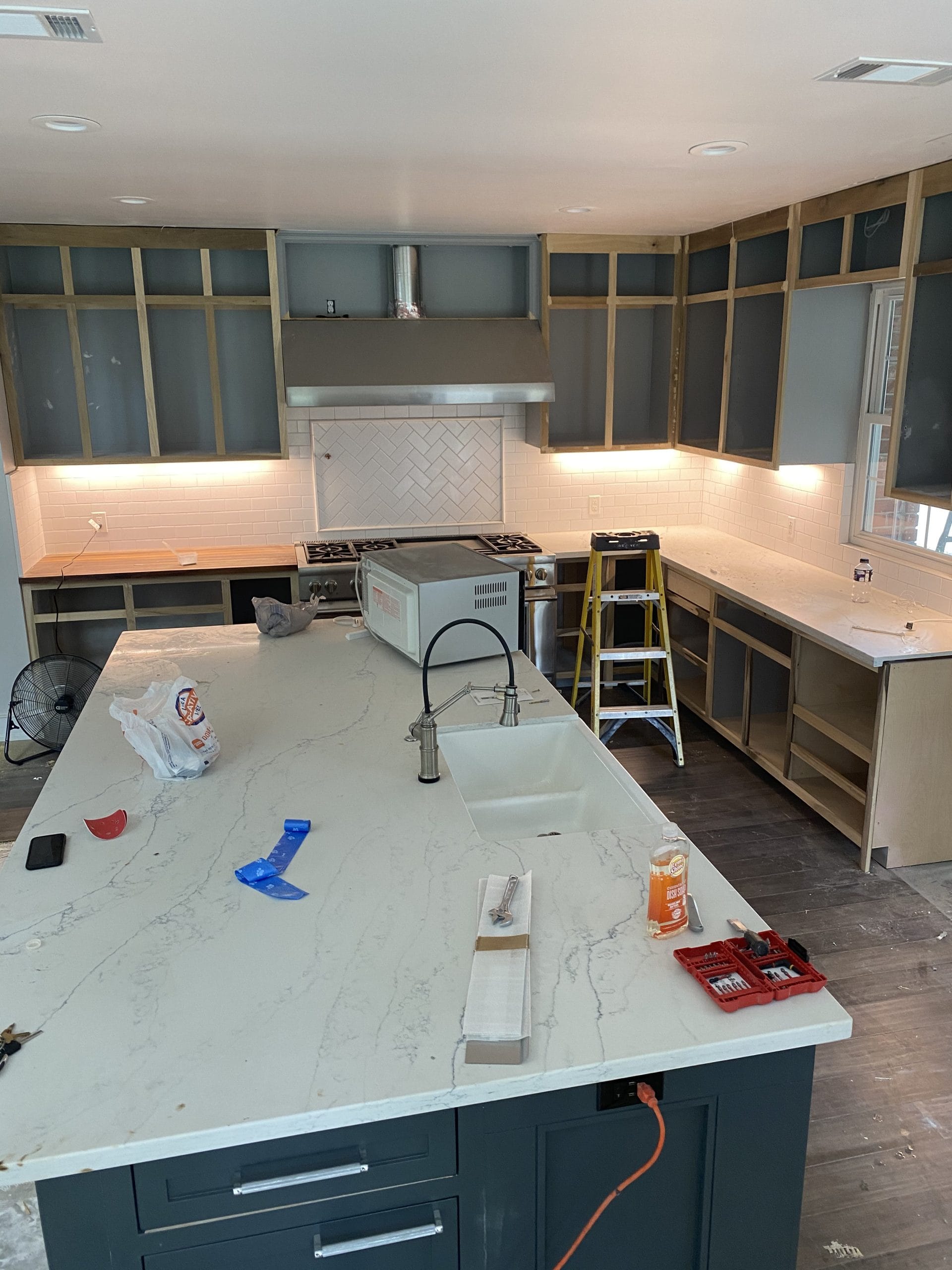 Existing kitchen cabinet boxes prepared for renewal, full project view 2